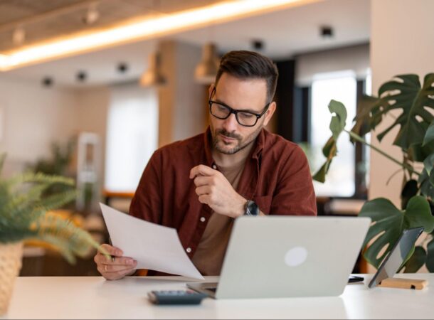 Man Evaluating the Customer Service at a Work Uniform Company
