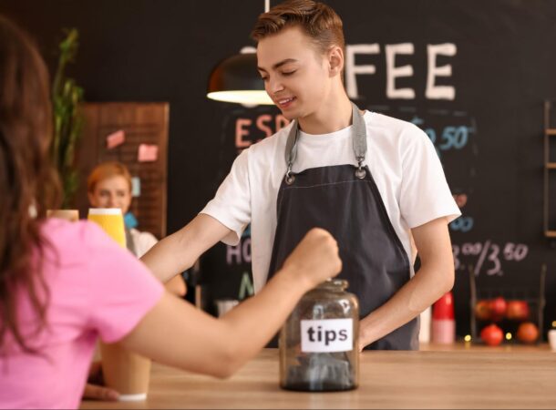Coffee Shop Server Wearing a Prudential Black Restaurant Apron