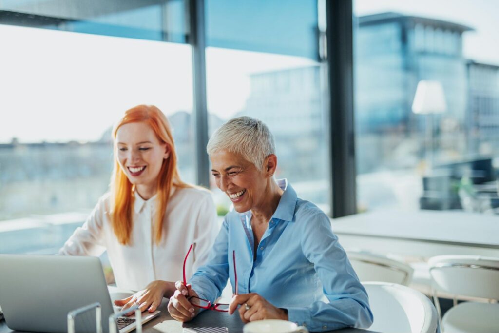 Older Woman and a Younger Woman Working Together