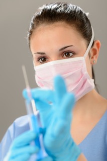 Nurse with Nitrile Blue Disposable Gloves