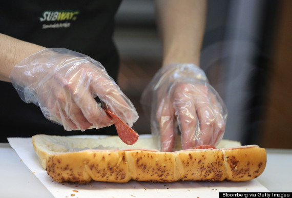 Clear Poly Disposable Gloves Being Used at Subway