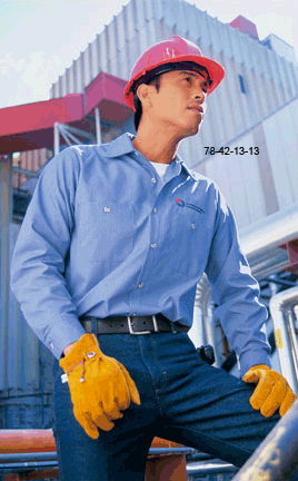 Man In Blue Denim With Hard Hat And Work Gloves On