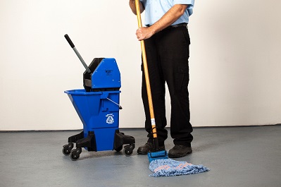 Male Worker Cleaning Floor