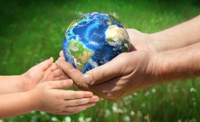 man gives planet Earth to baby man gives planet Earth to baby