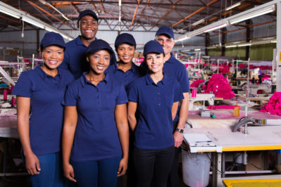 group of textile workers in production area