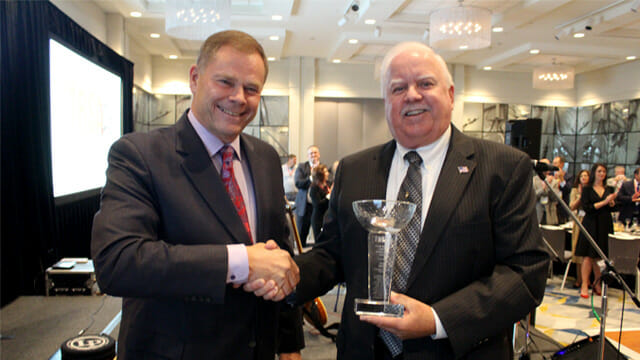 TRSA Chairman Jim Buik, Roscoe Co., and Tom Watts, Prudential Overall Supply