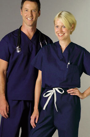 Young caucasian man and woman doctors in medical scrubs