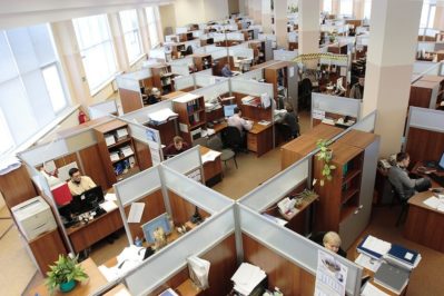cubicle workplace with workers