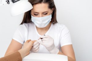 Girl From a Salon and Spa Wearing a Face Mask