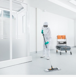 cleaner wearing protection uniform cleaning floor