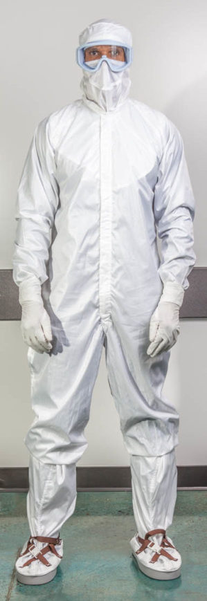 doctor in protective PPE suit wearing face mask and eyeglasses
