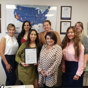 Prudential Overall’s office staff in Riverside, CA, celebrate the company’s Clean Green certification renewal.