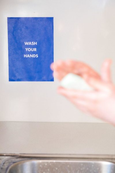 Blue wash your hands sign