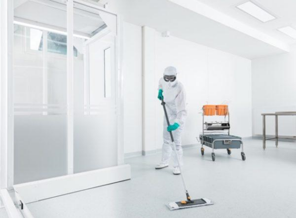 cleaner wearing protection uniform cleaning floor