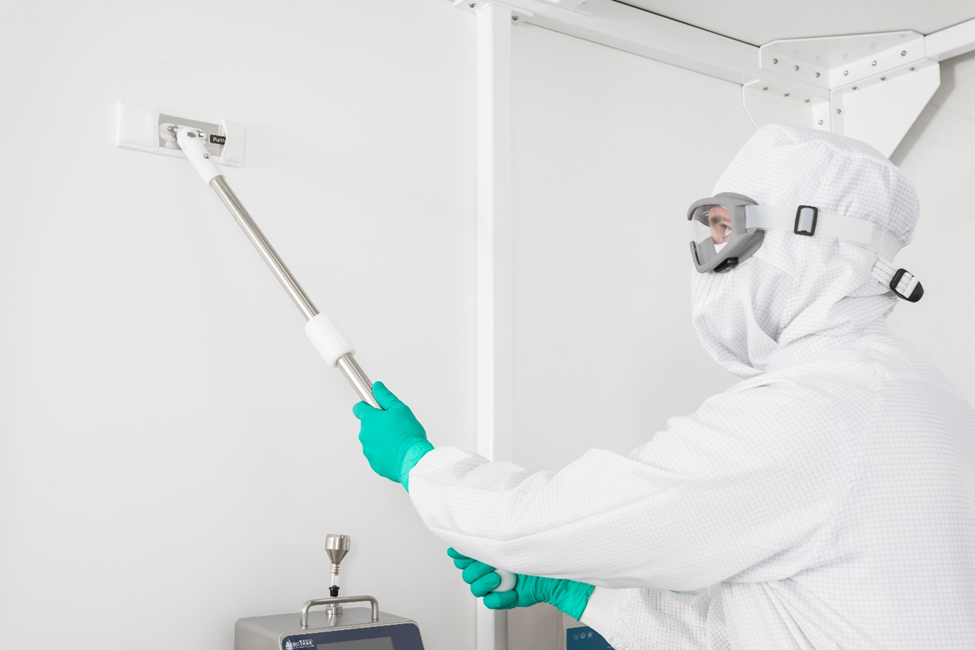 cleaner wearing protection uniform cleaning wall