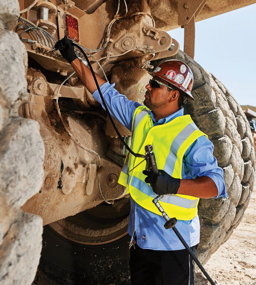 Man Wearing Reflective Safety Vest While Working